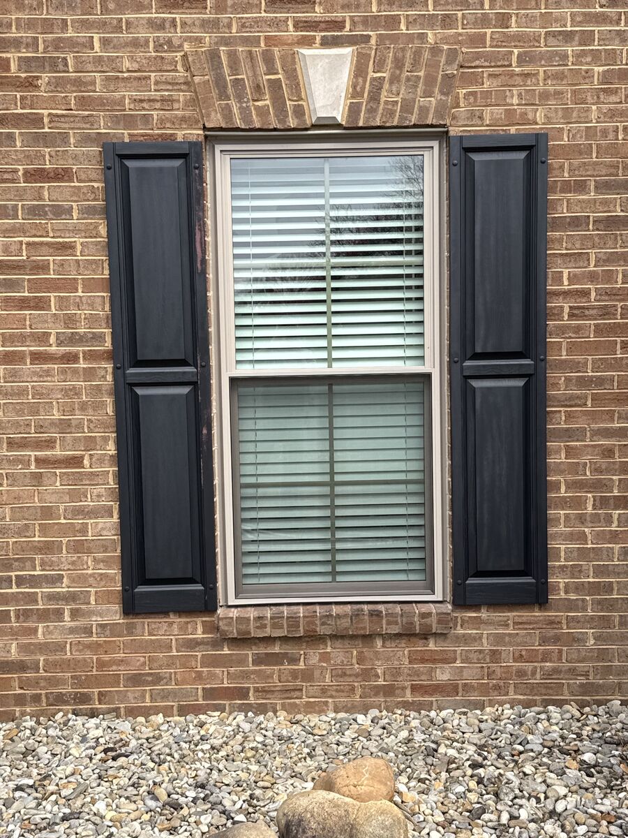 Professional window installation with custom trim work